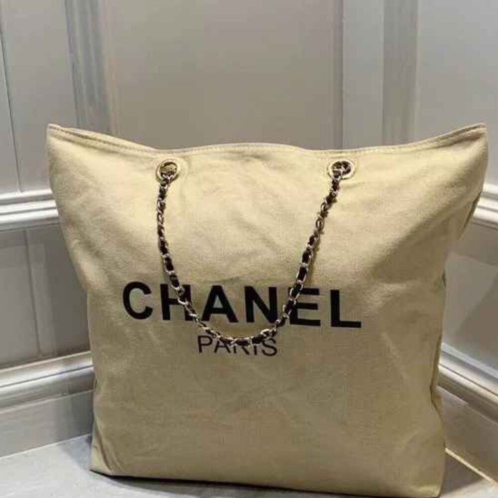 CHANEL PARIS CANVAS TOTE .W. ADJUSTABLE STRAP. NEW